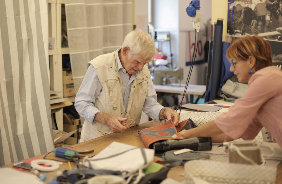 Craftsman making a leather bag in a workshop